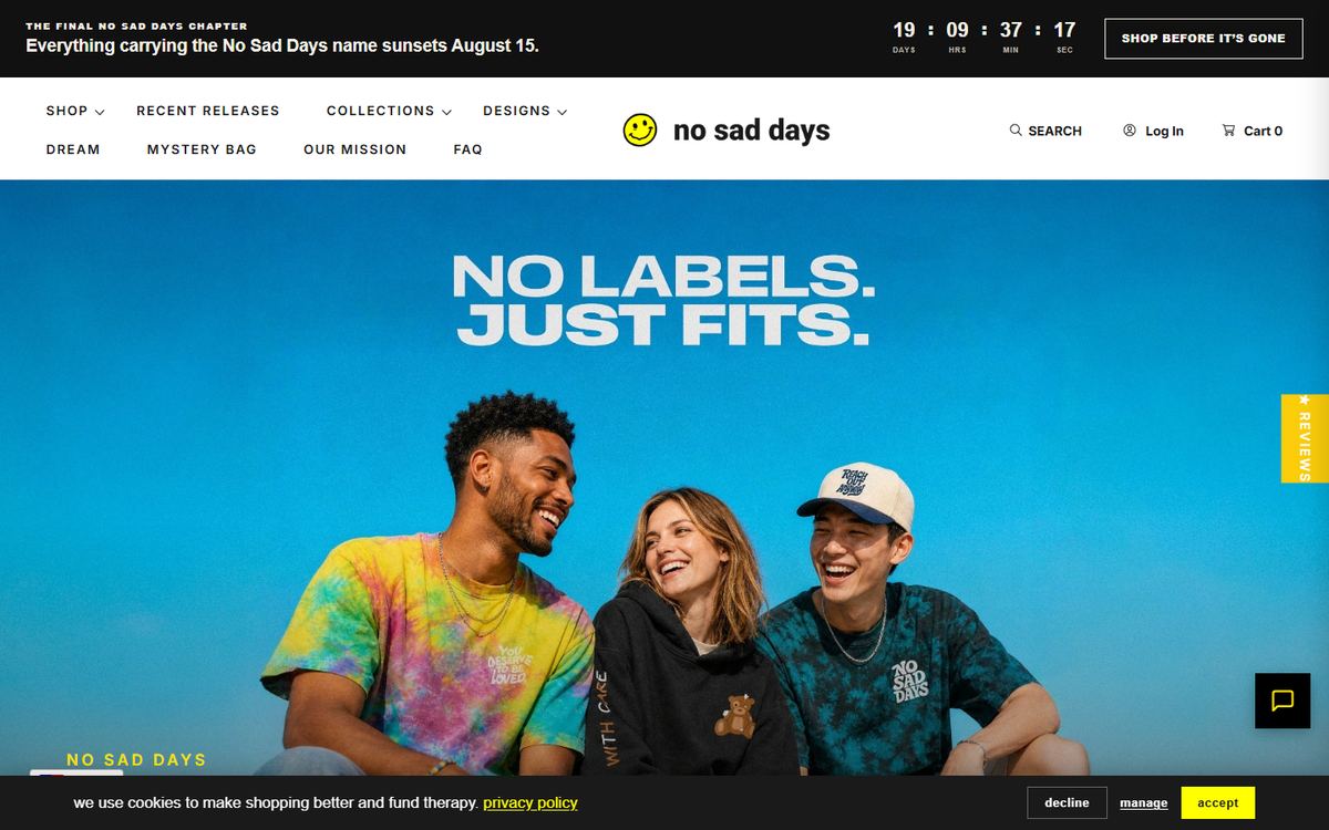 No Sad Days homepage with the headline No Labels. Just Fits. over a photograph of three people in mental health streetwear.